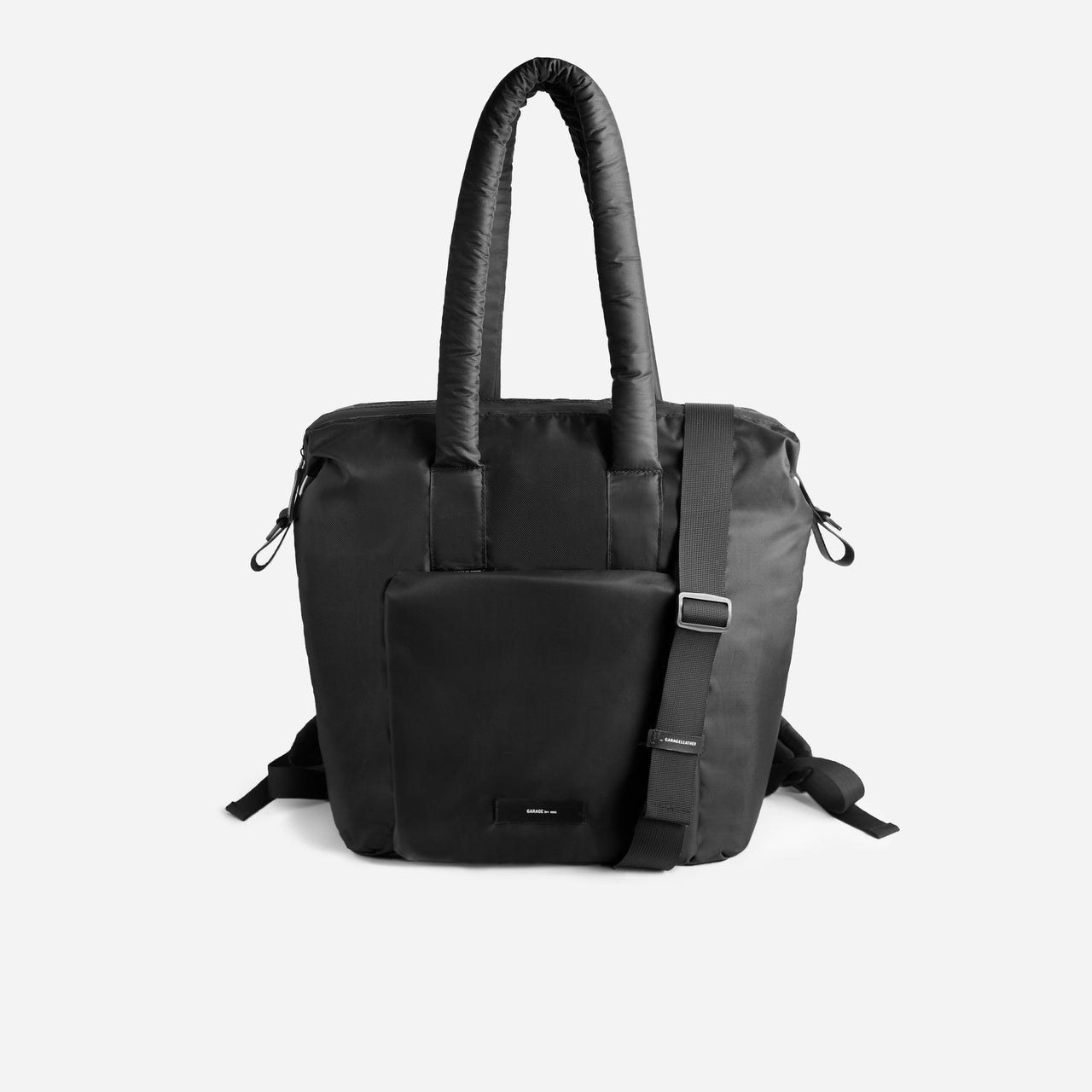 THE ESSENTIAL PUFFER TOTE . BLACK
